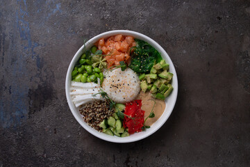 Top view of fresh ingredients for healthy eating on white plate