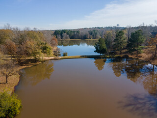Aerial landscape of trees and a pond in rural edge of southern Augusta Georgia