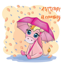Cute unicorn with an umbrella, it's raining, yellow leaves and the inscription Autumn is coming