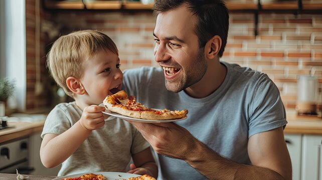 a cute little boy and his father sharing a joyful pizza meal in the kitchen, bathed in natural light, their faces beaming with happiness and smiles. - Powered by Adobe