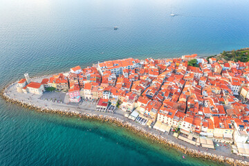 Aerial view of Piran old town, Slovenia, beautiful landmark. Scenic cityscape with medieval architecture and red tiled roofs, famous tourist resort on Adriatic seacoast, outdoor travel background - 782346409