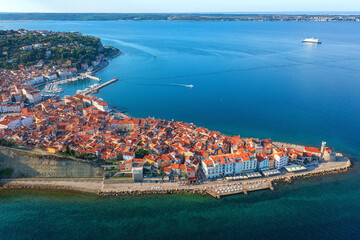 Aerial view of Piran old town, Slovenia, beautiful landmark. Scenic cityscape with medieval architecture and red tiled roofs, famous tourist resort on Adriatic seacoast, outdoor travel background - 782346439