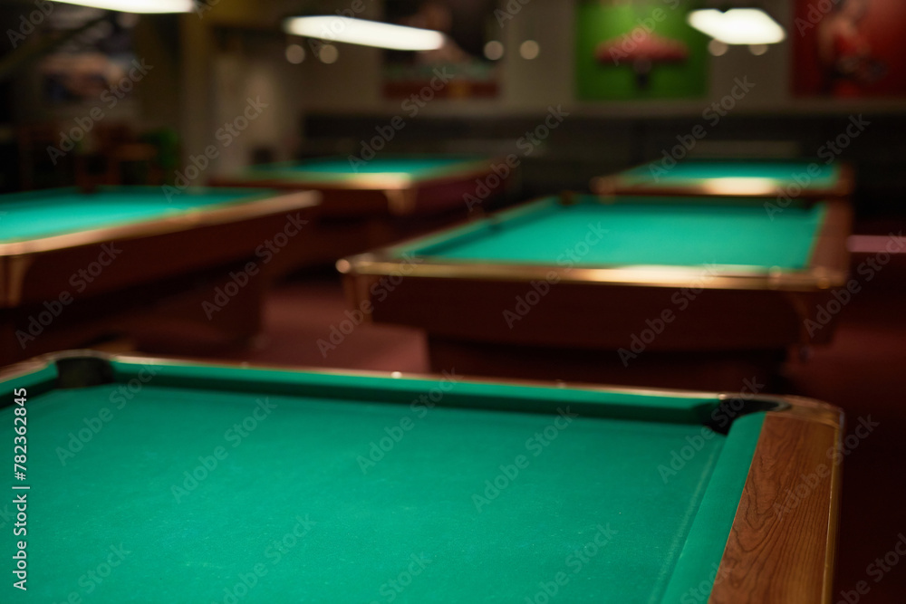 Wall mural Detail background image of green billiard tables in gaming area at nightclub no people - Wall murals