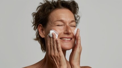 Woman Applying Facial Moisturizer