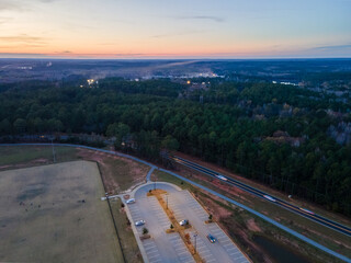 Aerial sunset landscape of Patriots Park fields and parking lot in Grovetown Augusta Georgia