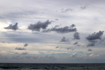 Rain clouds in the sky over the Mediterranean Sea.