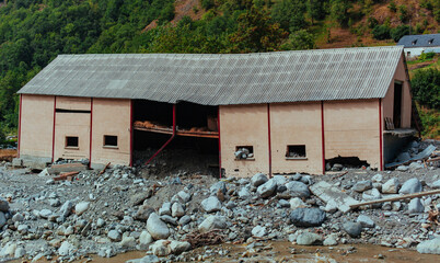 Barn destroyed by a natural rockfall disaster
