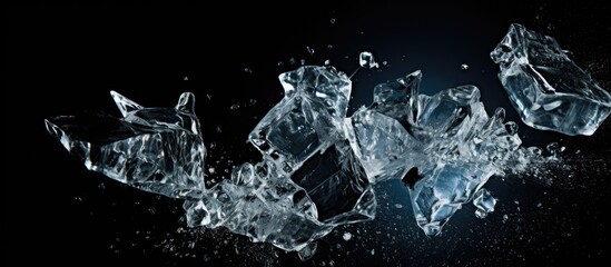 Crushed ice shards spread on black surface