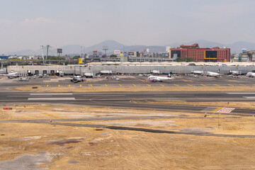 Benito Juárez International Airport, Mexico City, CDMX, Mexico - March 23, 2023 Volaris Commercial Airliners on the ground at the airport