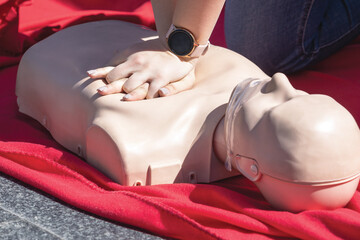 Paramedic performing CPR - Cardiopulmonary resuscitation and first aid