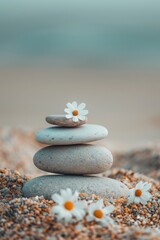 A white flower is placed on top of three rocks. The rocks are arranged in a pyramid shape, and the flower is positioned in the center. Concept of tranquility and harmony