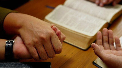 Men hands praying to god with the bible. Pray for god blessing. Religious beliefs Christian life...