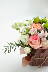 A bouquet of roses and eucalyptus