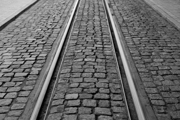 Tram tracks and cobblestones, a rare combination, travel by train