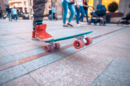 Close up of legs of boy skateboarding, sports concept, stock photo