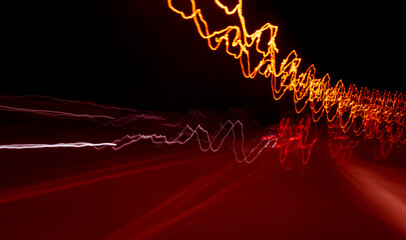 trembling lines of lights of cars with night. long exposure