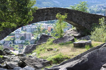 Romanic bricks bridge in Biasca, Ticino, Switzerland - obrazy, fototapety, plakaty