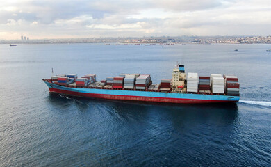 Aerial view of freight ship with cargo containers