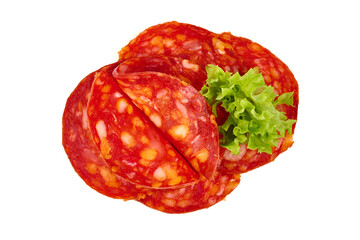 Spanish pork chorizo sausage slices, close-up, isolated on white background