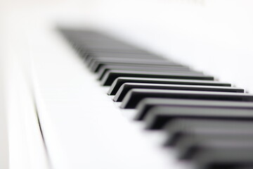 Grand piano keys close up, selective focus on keyboard. 