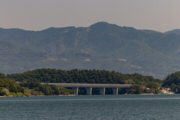 The Bilancino Lake. Lago di Bilancino, Barberino del Mugello, Florence, Italy: landscape at dawn of the picturesque lake in the Tuscan hills