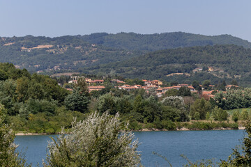 Fototapeta na wymiar The Bilancino Lake. Lago di Bilancino, Barberino del Mugello, Florence, Italy: landscape at dawn of the picturesque lake in the Tuscan hills