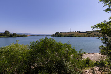 The Bilancino Lake. Lago di Bilancino, Barberino del Mugello, Florence, Italy: landscape at dawn of the picturesque lake in the Tuscan hills
