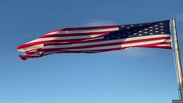 waving american flag in the sky