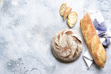 Homemade fresh baked bread with flour and ears . Top view. - 782484099