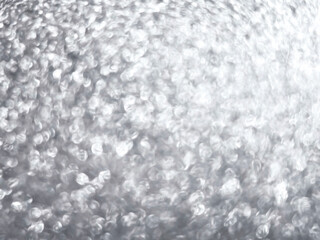 Obraz premium Festive silver background with bokeh effect