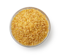 Top view of uncooked bulgur in glass bowl