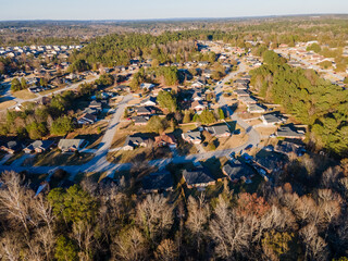 Aerial sunset landscape of suburban neighborhood Euchee Creek Trails in Grovetown Augusta Georgia