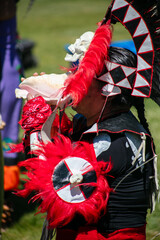 Mexico Mexican Aztec Dancers at an Outdoor Festival performing for guests in their traditional dress.