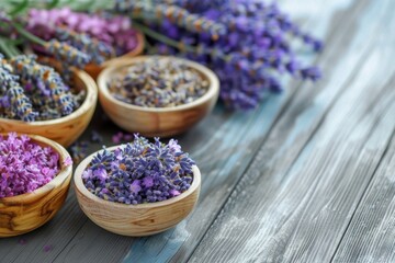 Various types of lavender displayed in wooden bowls on the table