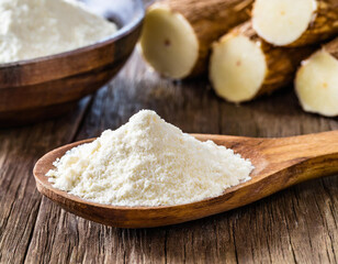 Wooden spoon with manioc flour. Root used in Brazilian cuisine