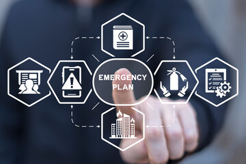 Man using virtual touch screen clicks inscription: EMERGENCY PLAN. Business emergency plan concept....