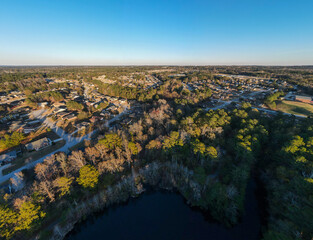 Aerial landscape of pond at Euchee Creek Greenway Trail during Fall in Grovetown Augusta Georgia