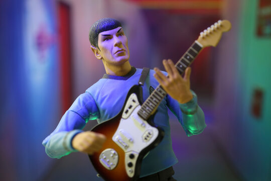 NEW YORK USA, JULY 9 2018: Scene from Star Trek the Original Series - Rock Out with your Spock Out concept - Mr Spock with an electric guitar in an Enterprise corridor - Art Asylum action figure