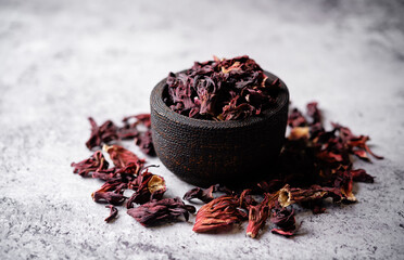 Dried Karkade tea leaves in a bowl - 782518089