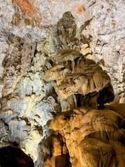  views of the incredible stalacties and stalagmites inside Dau Go cave in Halong Vietnam