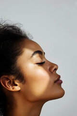 Side profile of a young african american woman, showcasing natural beauty and serene expression - Generative AI