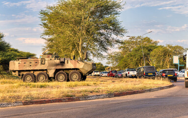 military vehicle, rebels and government army in an african country, street warfare 8×8 Light Armored Tactical Vehicle , © poco_bw