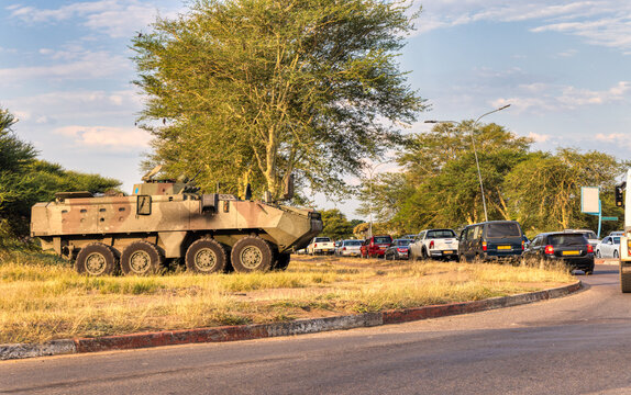 military vehicle, rebels and government army in an african country, street warfare 8&times;8 Light Armored Tactical Vehicle ,