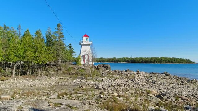 South Baymouth Range Front Lighthouse, located on Manitoulin Island, Ontario, stands as a maritime sentinel, guiding ships with historical significance.