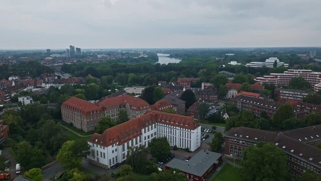 An aerial drone view of Aasee Lake in M&uuml;nster . Lake Aasee is an artificial lake located in M&uuml;nster , Germany .