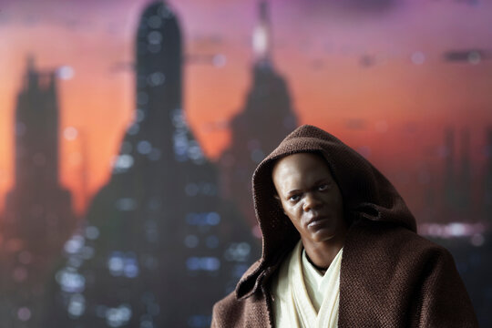 NEW YORK USA, APRIL 27 2019: Jedi Master Mace Windu in Coruscant. Coruscant cityscape in the background. - Hasbro action figures