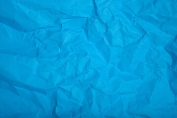 Crumpled blue paper texture. Background.
