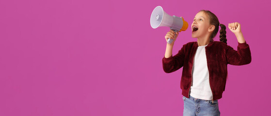 Little girl with megaphone screaming on purple background