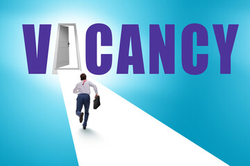 Vacancy concept with road leading to open door