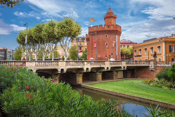 The bridge through the river Basse and Le Castillet - Perpignan, France